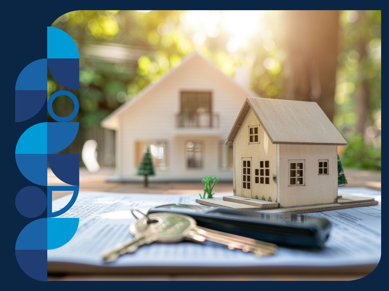 A close-up image of a wooden model house on a table next to a ring of keys.